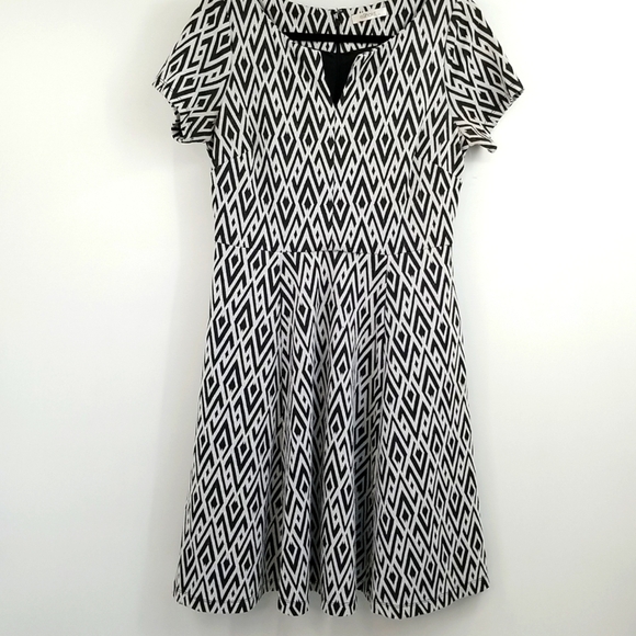 Eshakti Fit & Flare Dress with Pockets - Picture 1 of 11